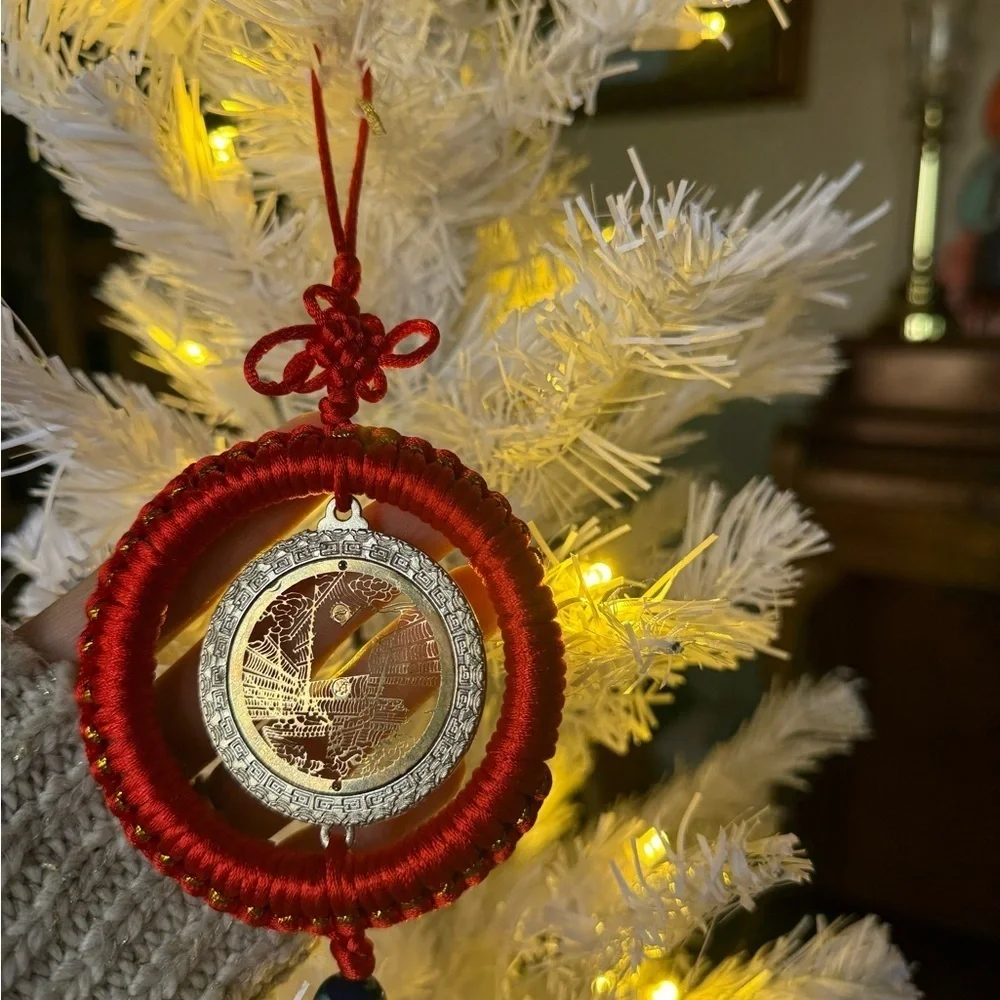 Chinese Feng Shui lucky coin hanging charm with a red knot and tassel Ornament
